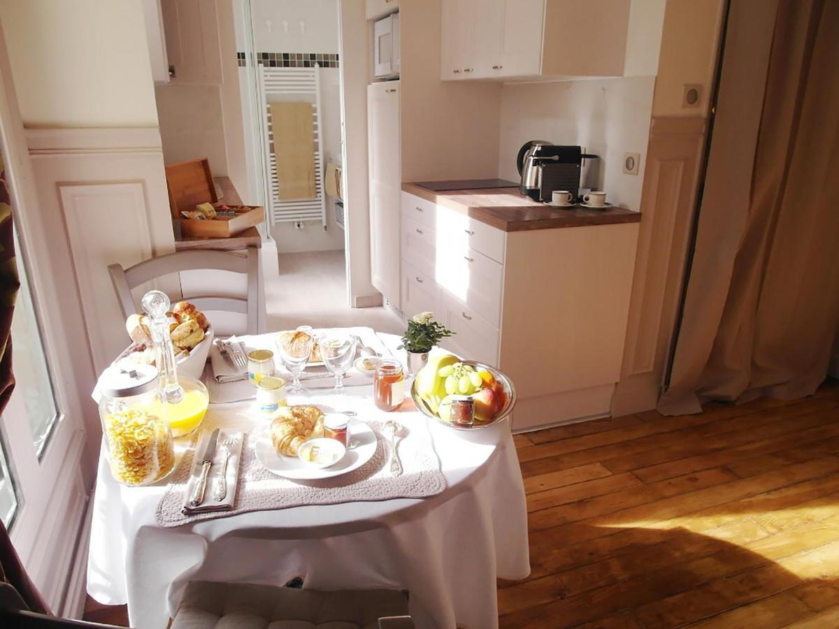Chambre D Hote : Louvre Elegant Apt Suite Frühstückspension Paris